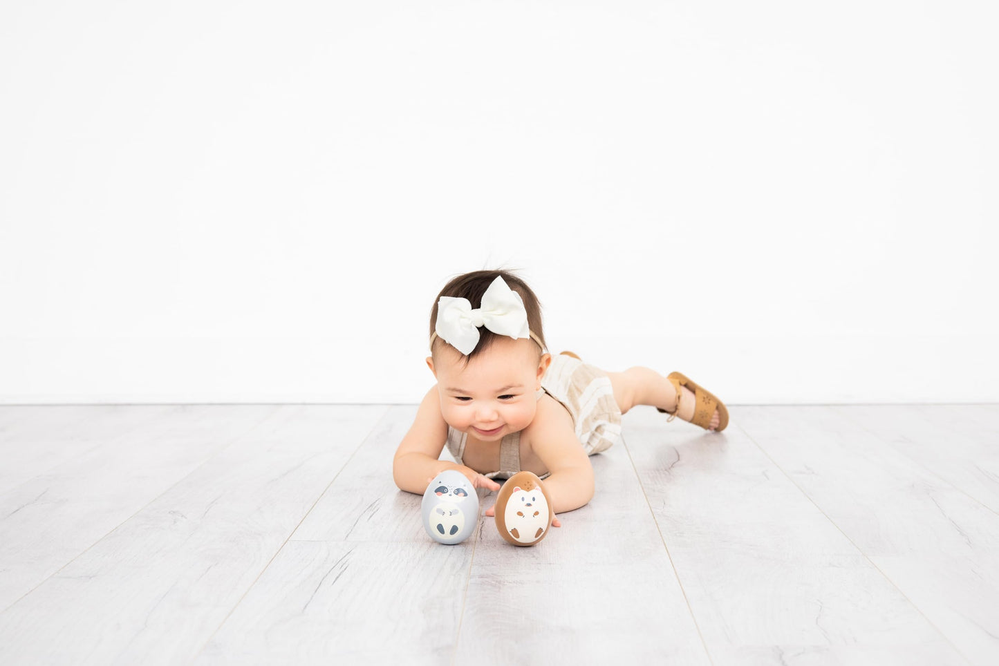 Pearhead Wooden Wobble Toy Set, Raccoon & Hedgehog Montessori Balance Toys for Babies 6+ Months, FSC Certified, Sensory Tummy Time Development Toy