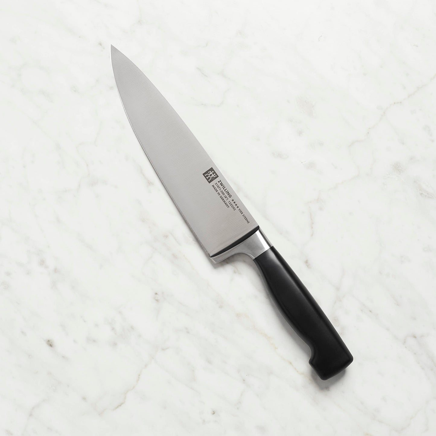 ZWILLING Four Star 8-inch Razor-Sharp German Chef's Knife, Made in Company-Owned German Factory with Special Formula Steel perfected for almost 300 Years, Dishwasher Safe