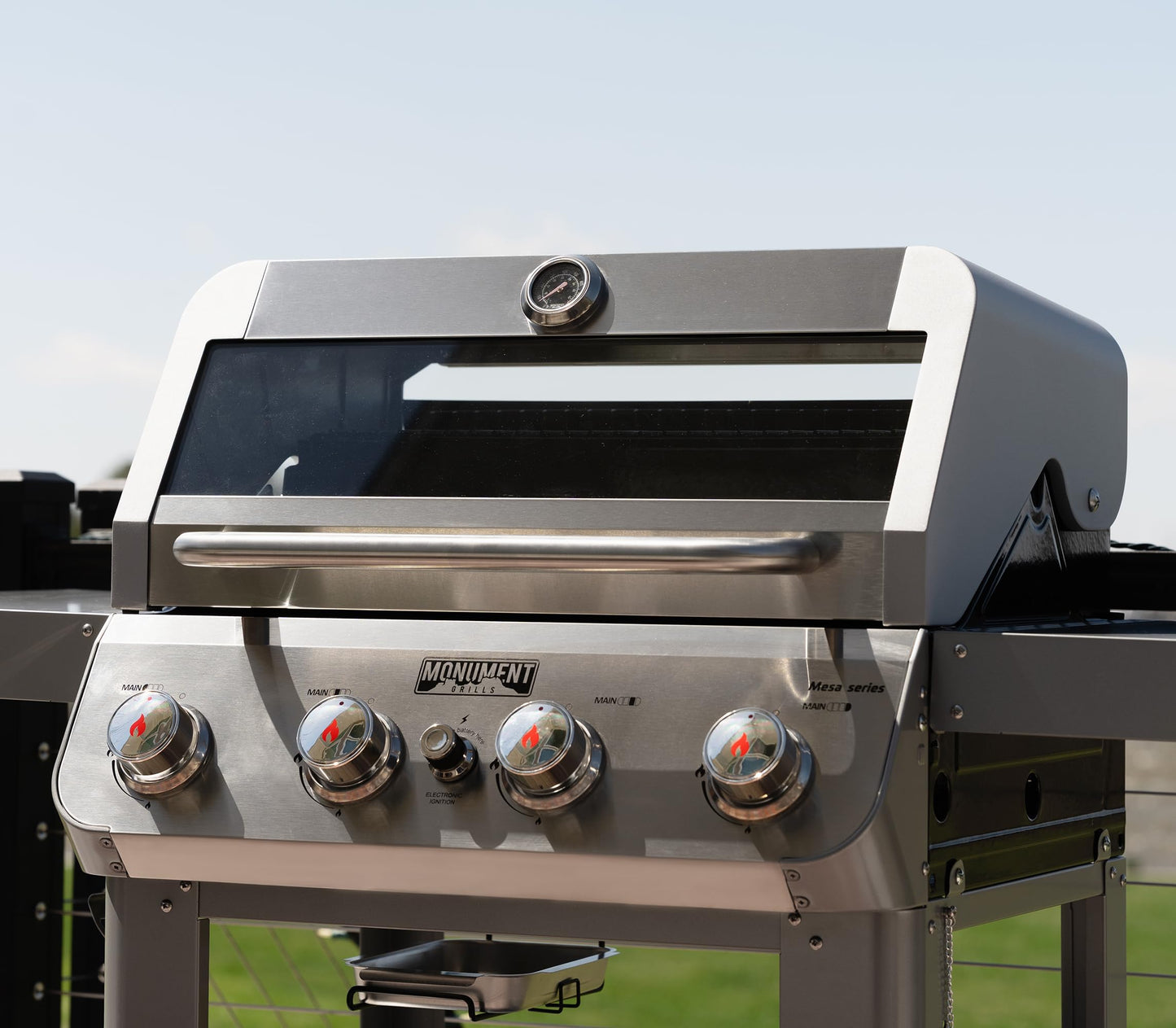 Monument Grills 4-Burner Liquid Propane Gas Grill, Silver Stainless Steel Grill Outdoor Patio Garden Barbecue Grill with Clearview® Lid and One Foldable Shelf, Mesa400MF