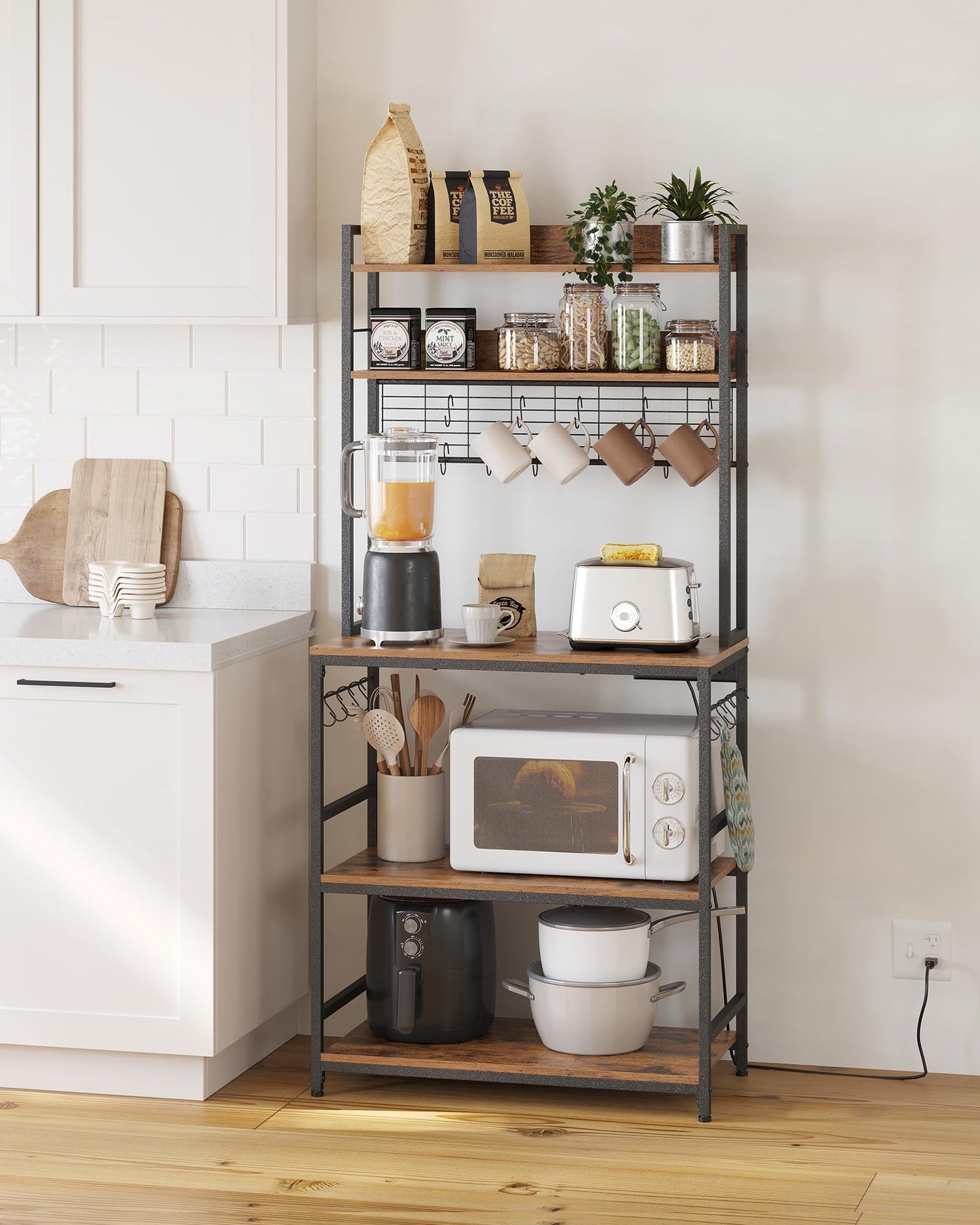 VASAGLE Bakers Rack with Power Outlet, Microwave Stand, Kitchen Tall Utility Storage Shelf, with Metal Wire Panel, 14 Hooks, 15.7 x 31.5 x 66.9 Inches, Rustic Brown and Ink Black UKKS025B01