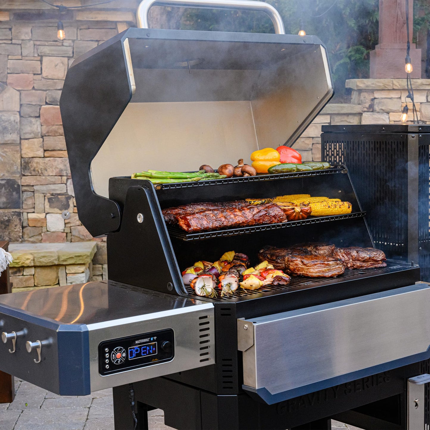 Masterbuilt® Gravity Series® 1050 Digital Charcoal Grill and Smoker with Digital Control, App Connectivity and 1,050 Cooking Square Inches in Black, Model MB20041220