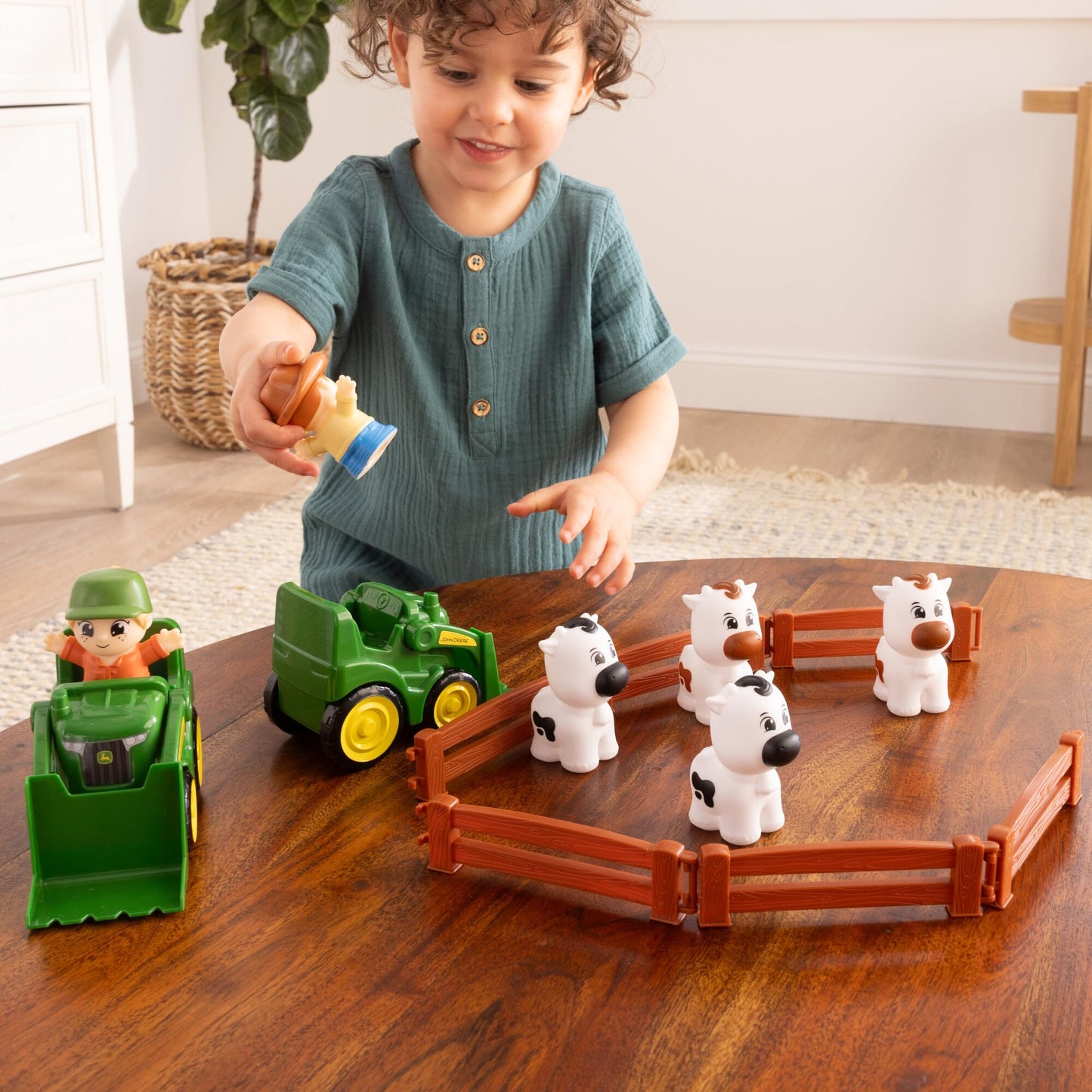 TOMY The Cows are Out! Farm Animal Playset - Preschool Farm Set with Tractors, Cows, Farmers & Fences - 14 Pieces - Ages 18 Months+