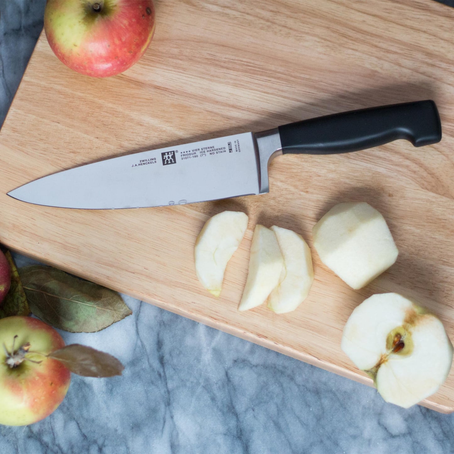 ZWILLING Four Star 8-inch Razor-Sharp German Chef's Knife, Made in Company-Owned German Factory with Special Formula Steel perfected for almost 300 Years, Dishwasher Safe